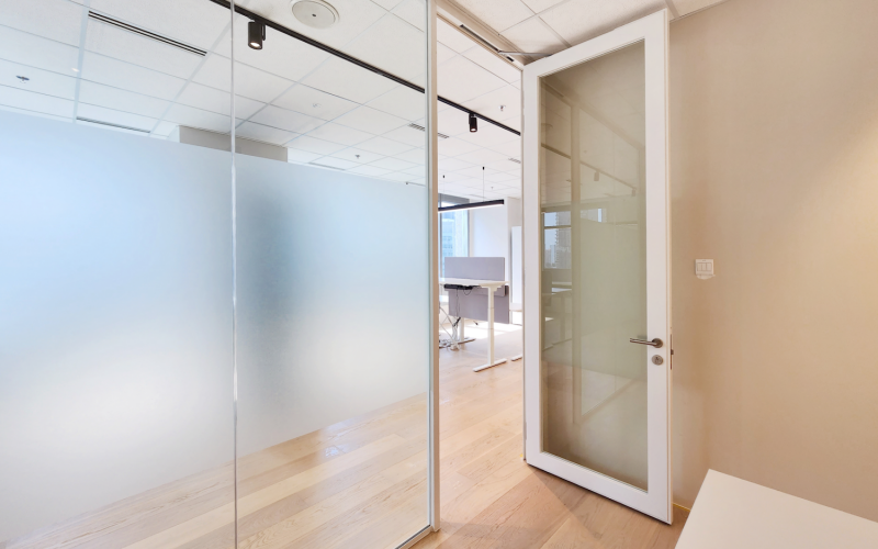 Minimalistic Workspace With White Single Glazed Partitions