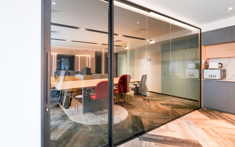 Maximize Office Privacy with Tinted Glass Sliding Door System