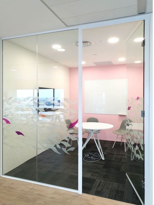 Showcasing Unique Decal on Glass Partitions – Framed Glass Door