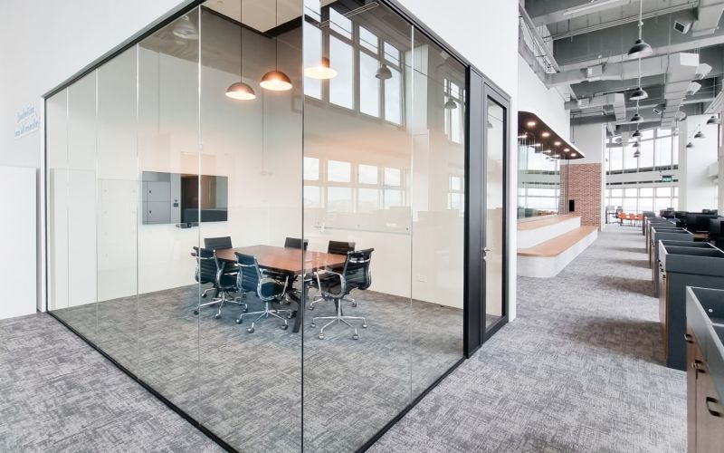 Meeting Room With Single Glazed Glass Wall and Tech Panels