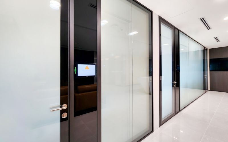 Meeting Room with Switchable Glass Design and Tech Panel