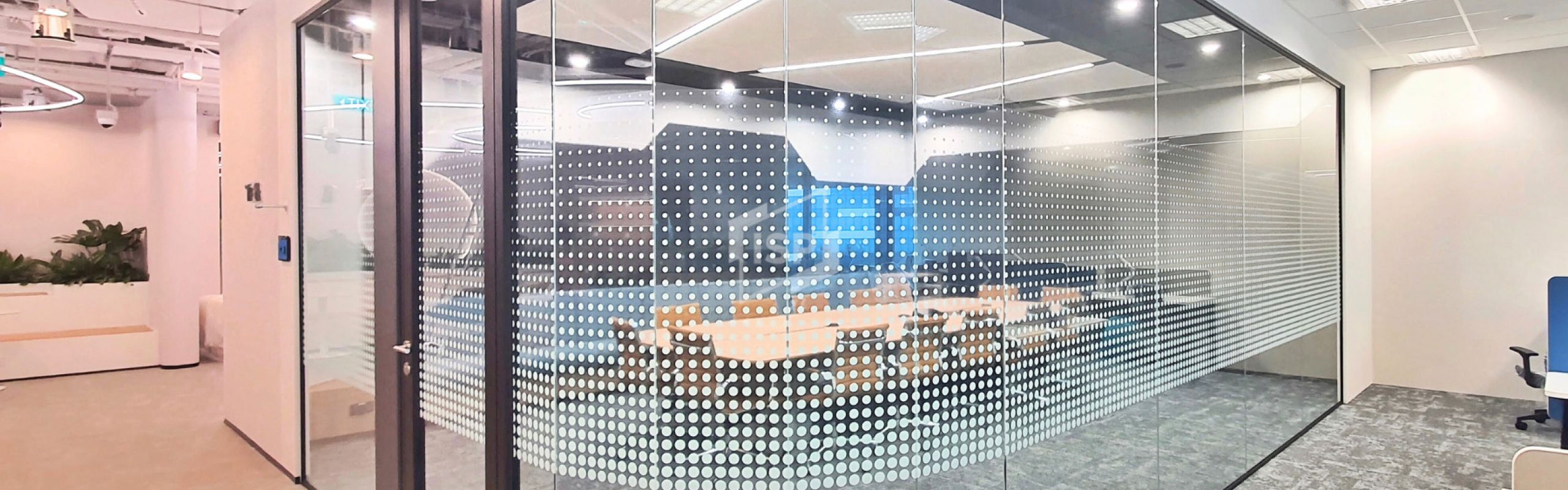 Corporate Office Design with Segmented Acoustic Glass Panels