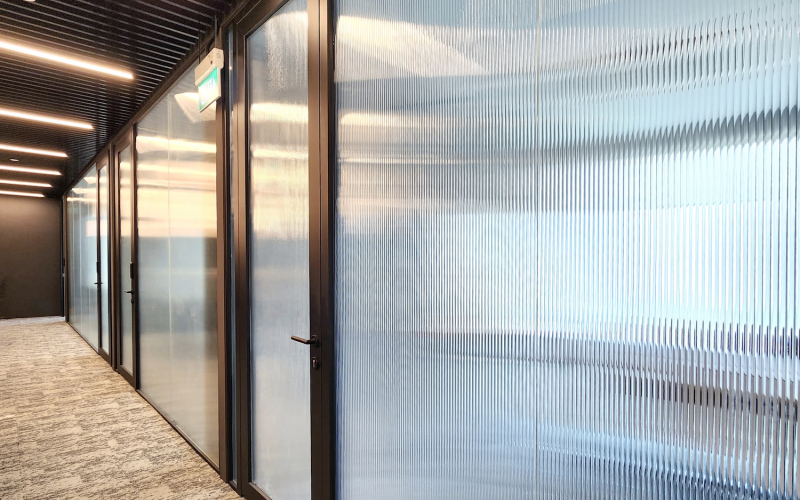 Stylish Reeded Glass Partition for Modern Workspaces