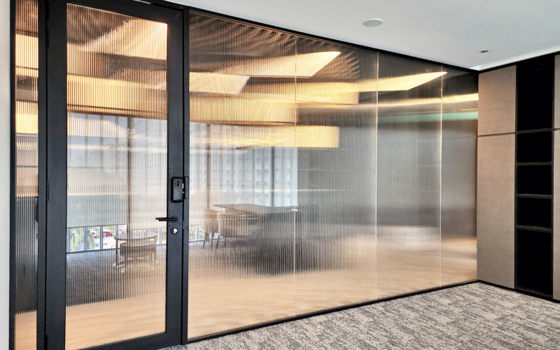 Stylish Reeded Glass Partition for Modern Workspaces