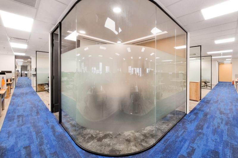 Infuse Personality into Meeting Spaces with Curved Glass Design