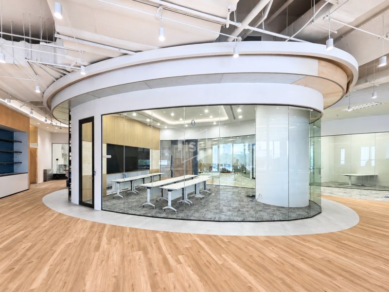 Curved acoustic glazed partition for modern office